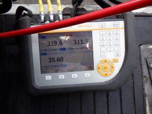 Hydraulic Pressure Testing during inspection of an excavator