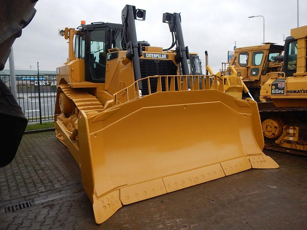 Freshly painted bulldozer in China. Technical inspection, PSI